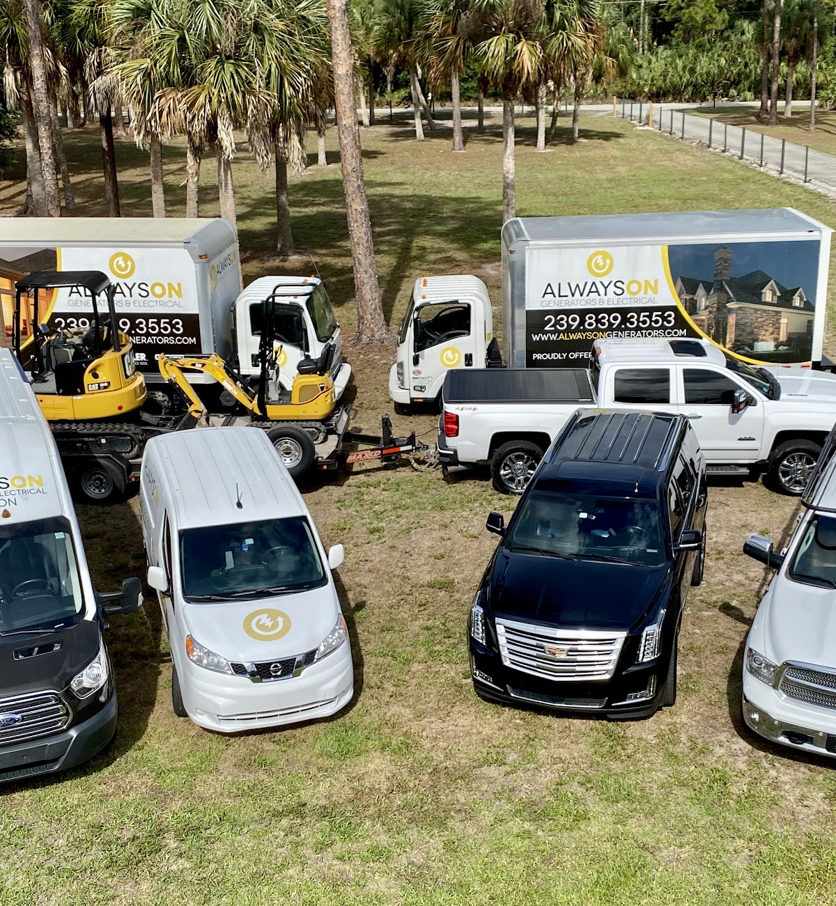 a group of Always On Generators vehicles parked in a field