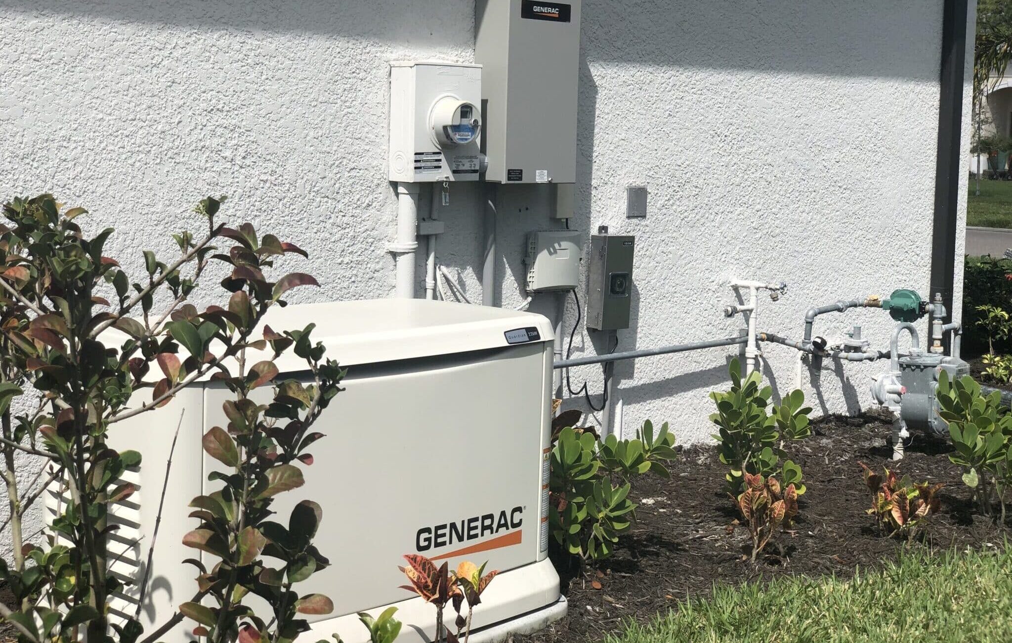 a white power generator outside of a building